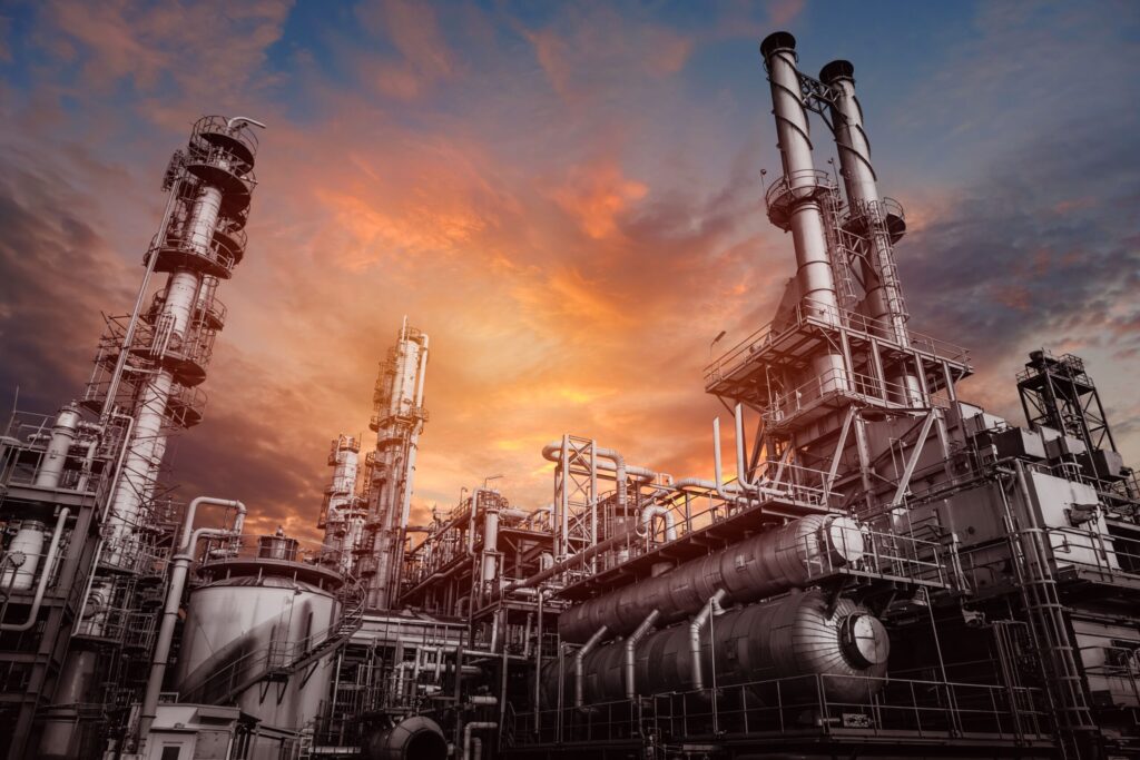 Picture of a Refinery in sunset for the banner section of Oil and Gas Courses page